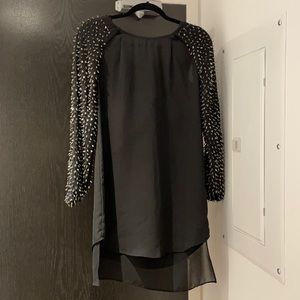 Black dress/top with stud like beaded sleeves